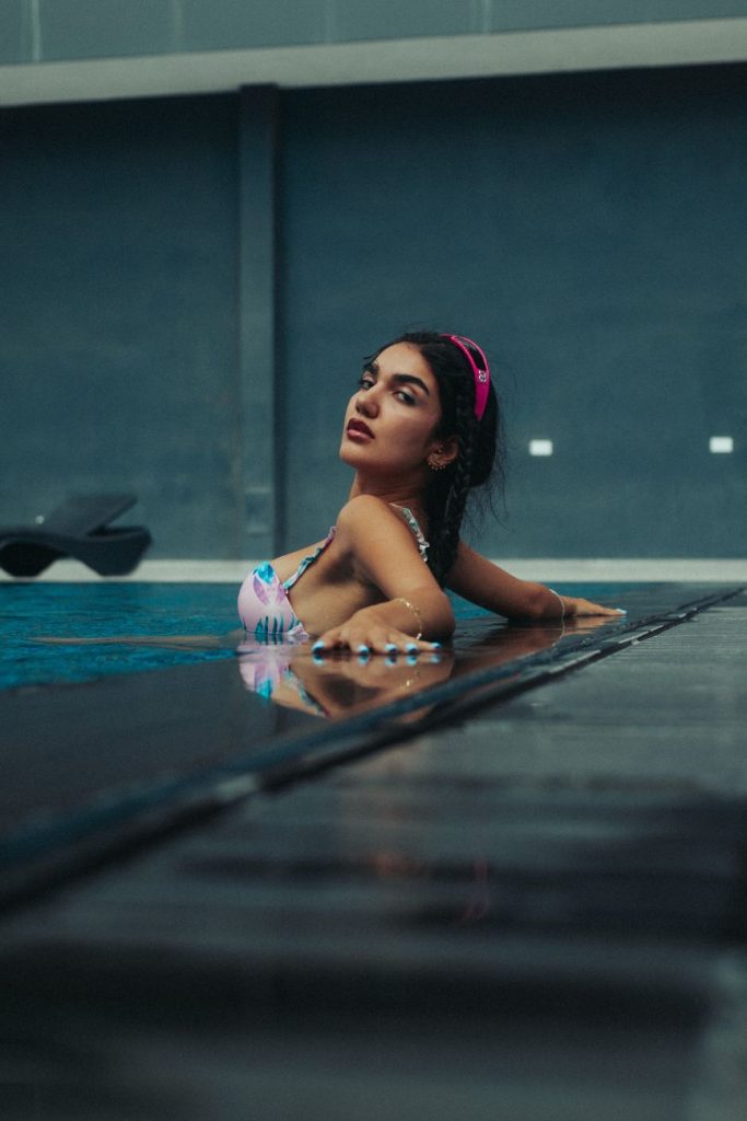 Woman in a bikini by the water